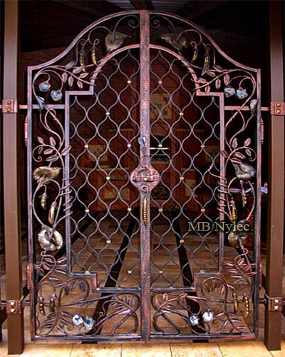 Decorative forged door grille
