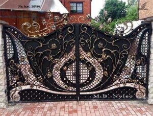 Half-solid gate with gilded scrolls