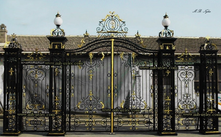 Palace-style wrought iron gate set with a driveway gate between tall lantern pillars and wickets on both sides