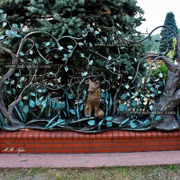 Forged fence span with a fox scene