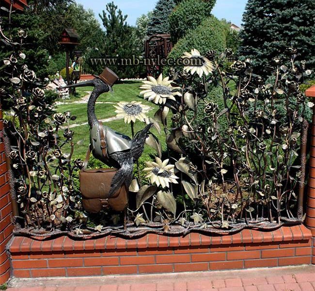 Forged fence span with stork and letterbox wrought