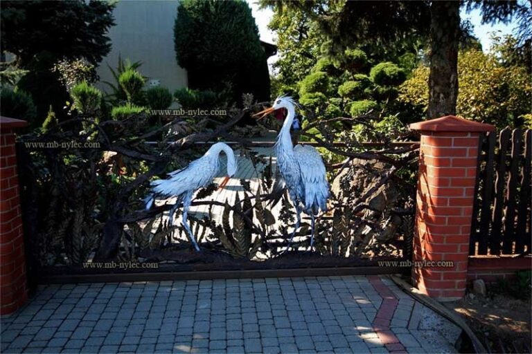 Wrought iron gate with herons scene forged