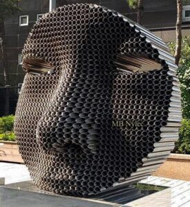 Modern Steel Face Statue