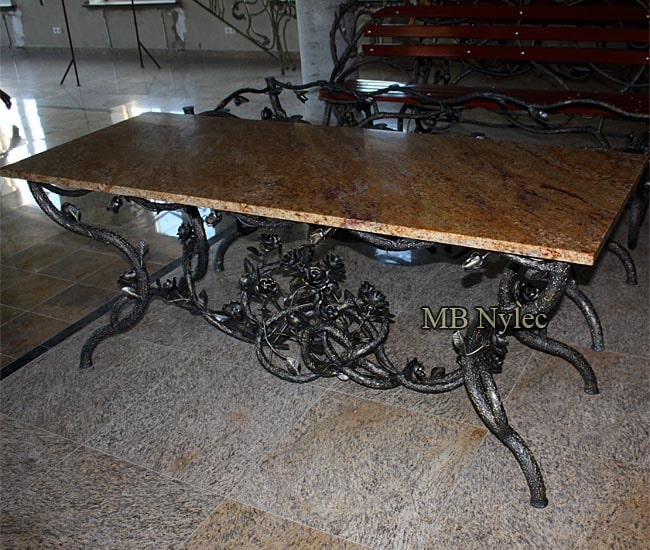 A forged table with a stone top