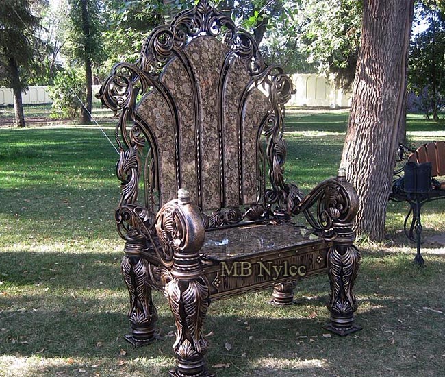 Forged throne - a huge armchair covered with granite