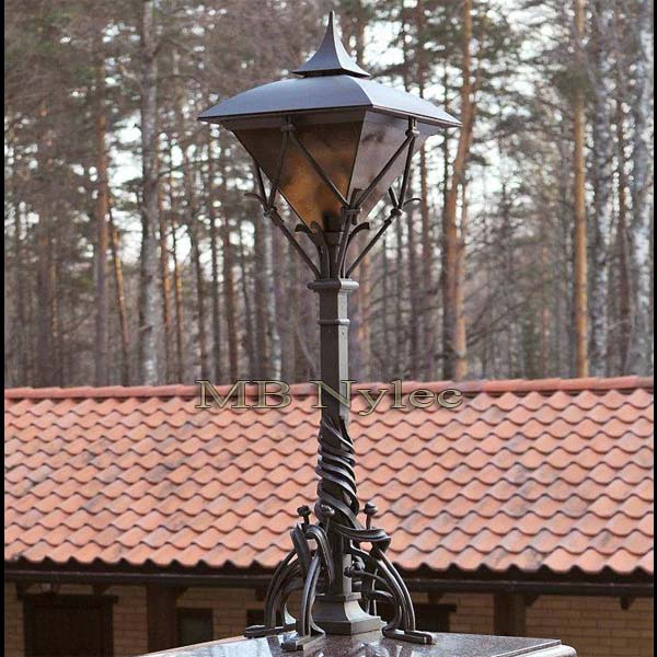 Designer forged lamp
