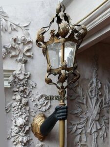 Wall Lamp with Hand Holding a Torch
