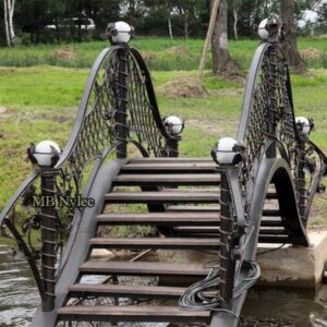 Stepped garden bridge with lamps