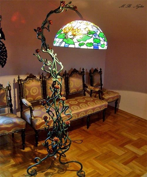Forged interior lamp with a stained glass shade
