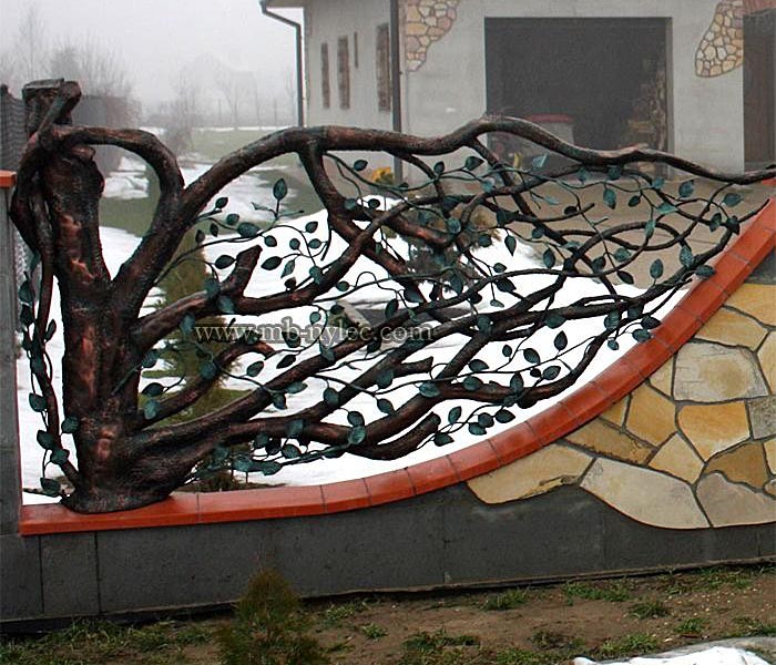 Forged fence in the form of a tree