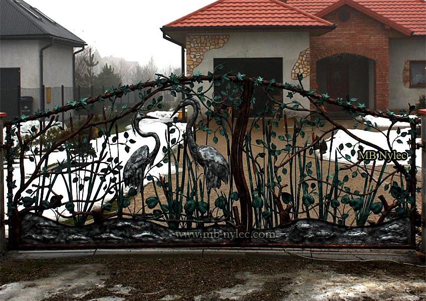 Forged gate with herons