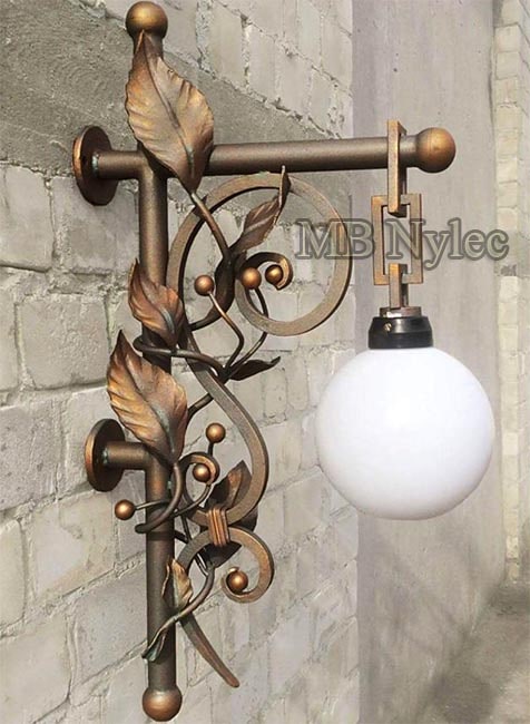An elegant forged wall lamp