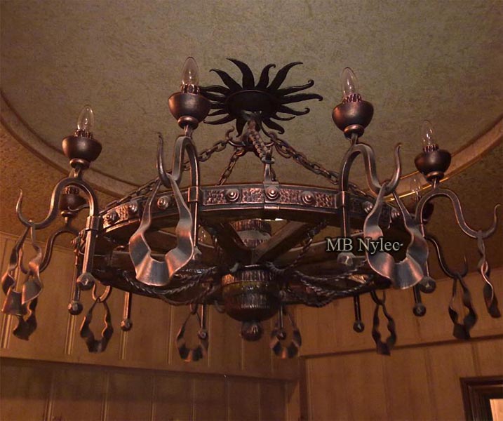 Forged chandelier in the highlander style