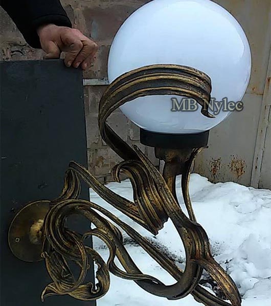 Forged garden sconce