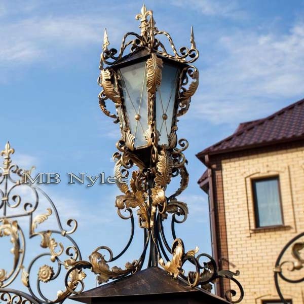 Forged lamp in the palace type
