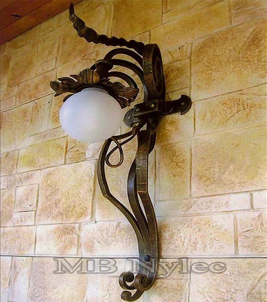 Forged outdoor sconce