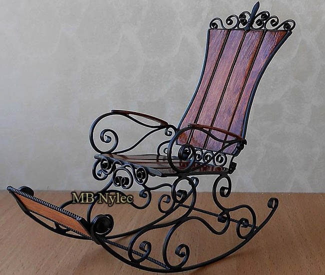 Forged rocking chair with footrest