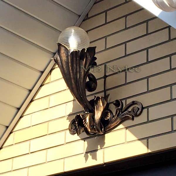Handmade forged acanthus style wall lamp