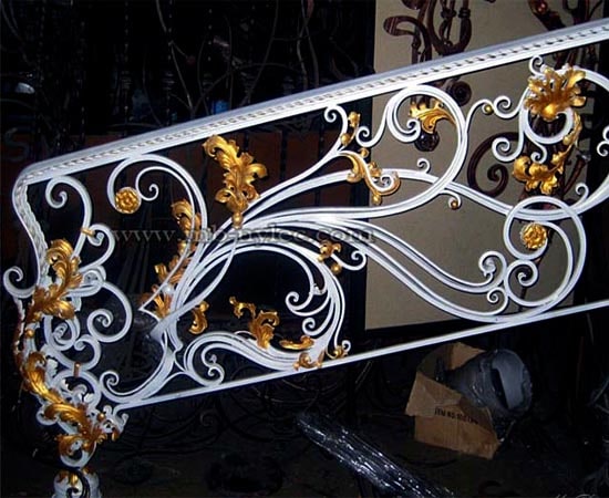 Wrought iron stair railing in white