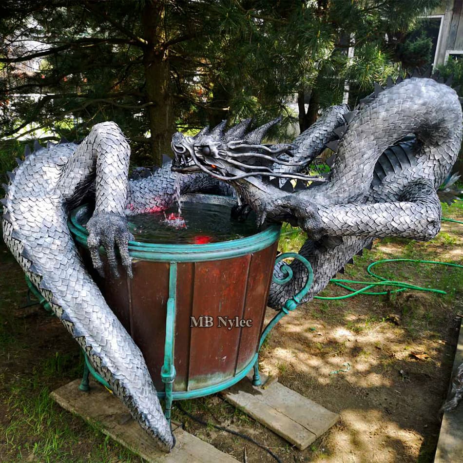 forged fountain - metal dragon
