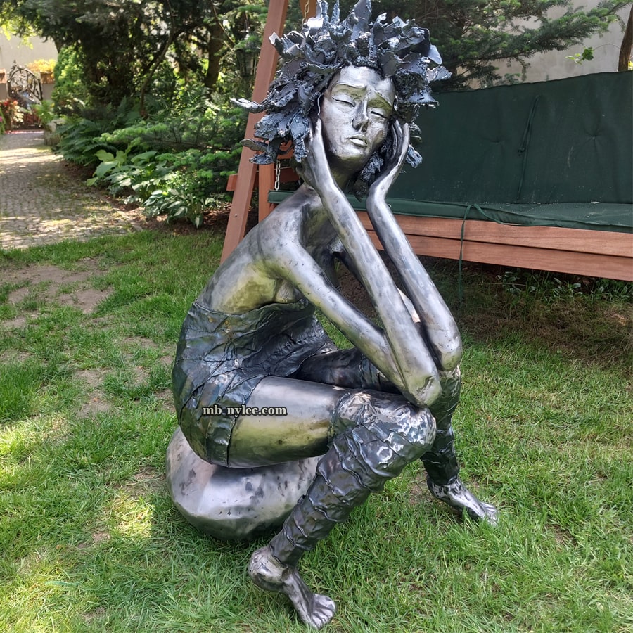 Steel-garden-sculpture-pensive-woman