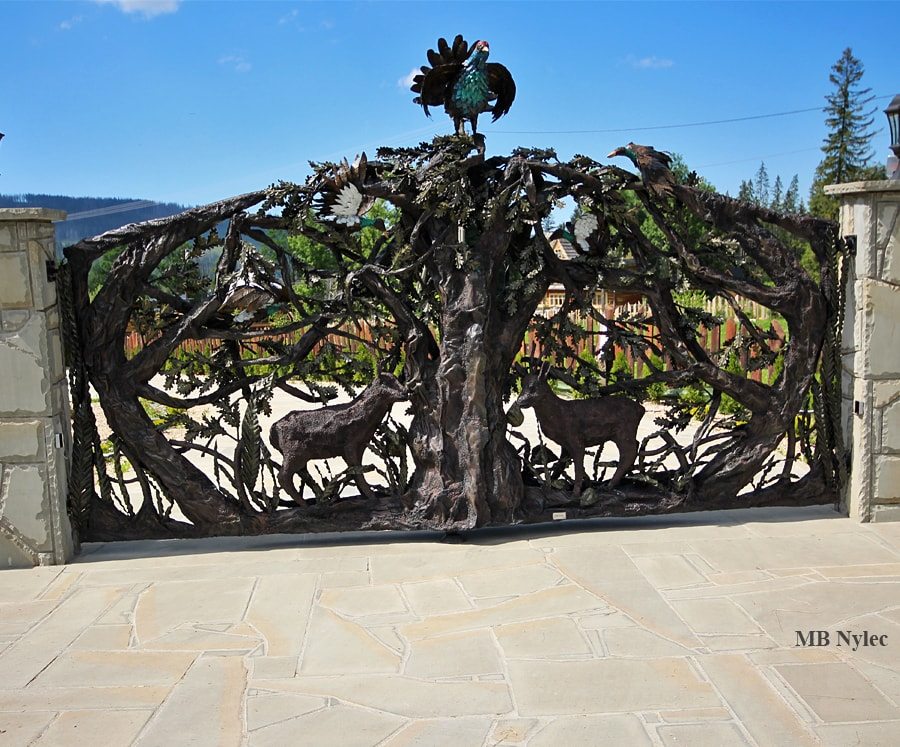 3D forest gate with forged animals among dense branches