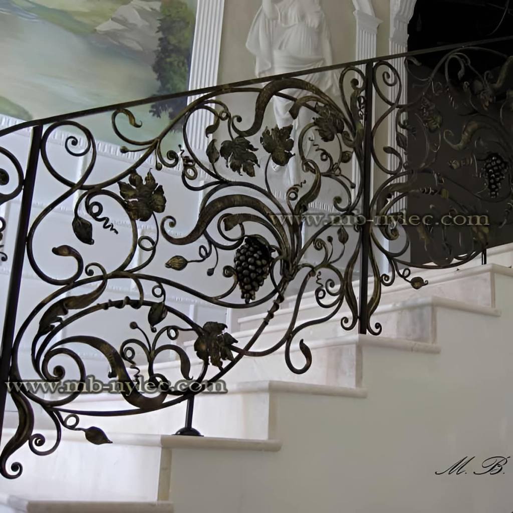Art Nouveau interior railing BA12 with forged grapes, vine leaves and tendrils on a white stair
