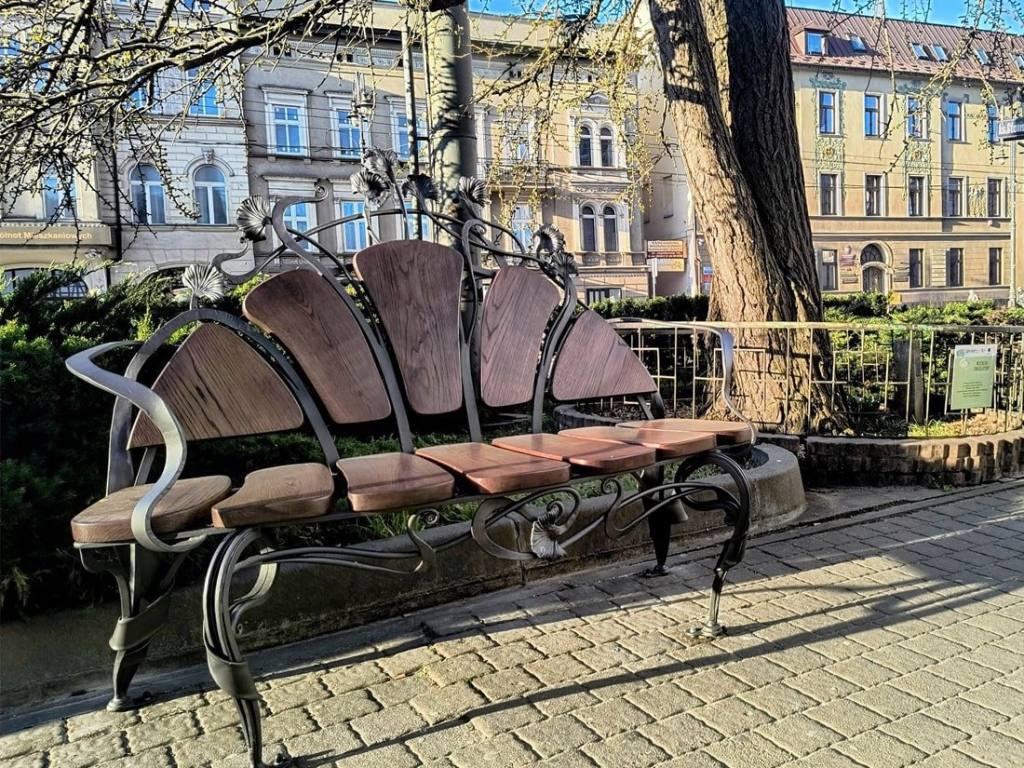 Forged bench MK17 installed on a pavement in central Bydgoszcz