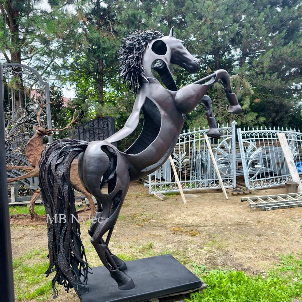 Custom metal horse sculpture in a garden