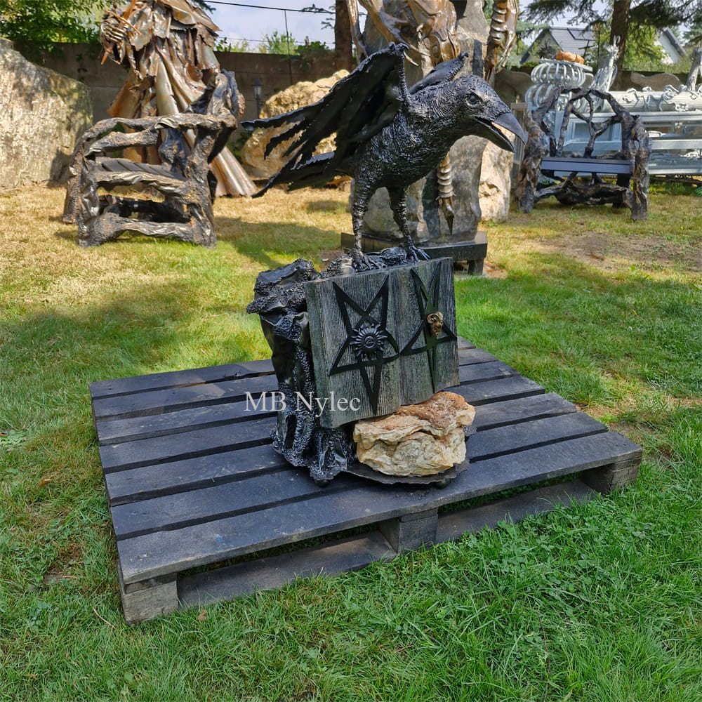Custom raven and pentagram sculpture on a wooden pallet
