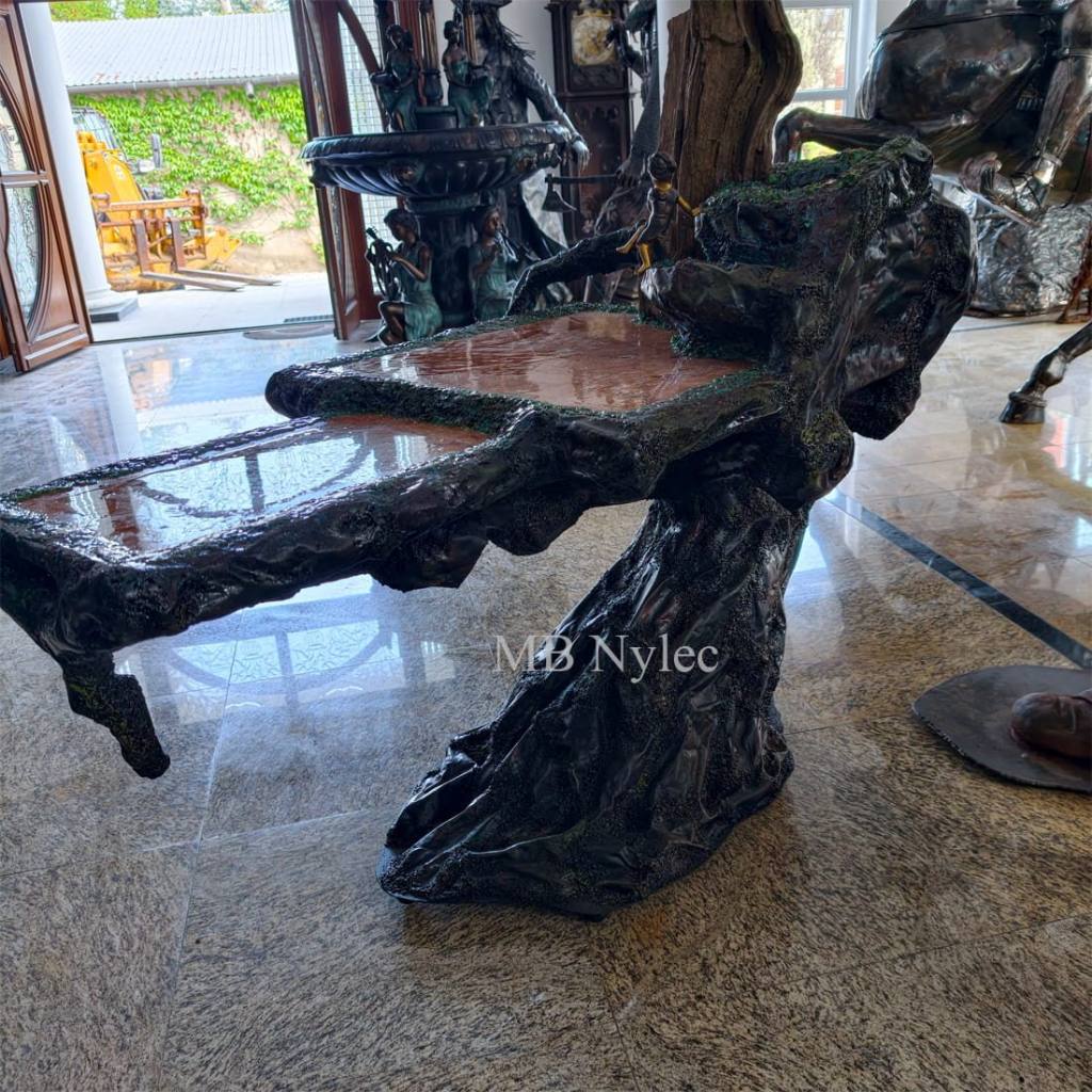 Designer coffee table with resin-sealed stone top in a showroom