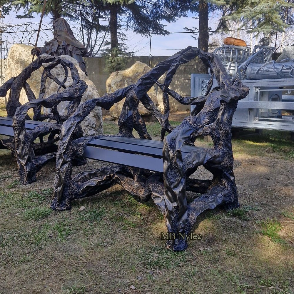 Pair of designer garden armchairs forged as steel tree limbs