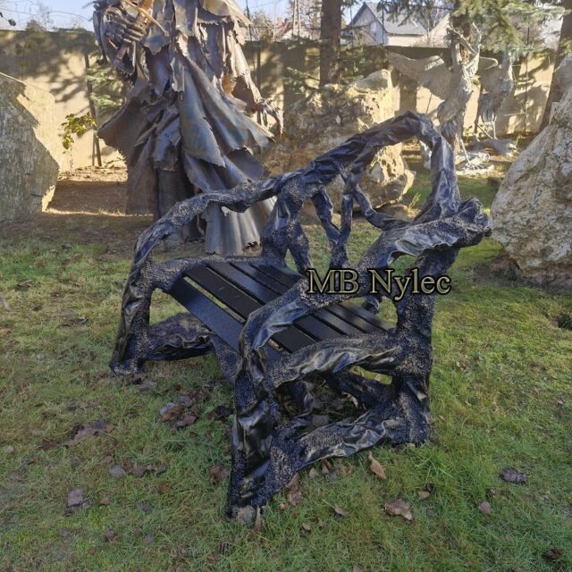 Forged branch chair sculpture in the workshop yard