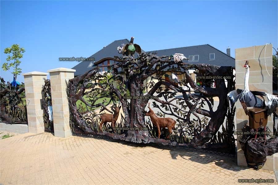 Forged gate in the BM30 set with roe deer, herons and ducks among branches