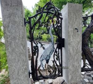 Garden Gate with Heron Sculpture