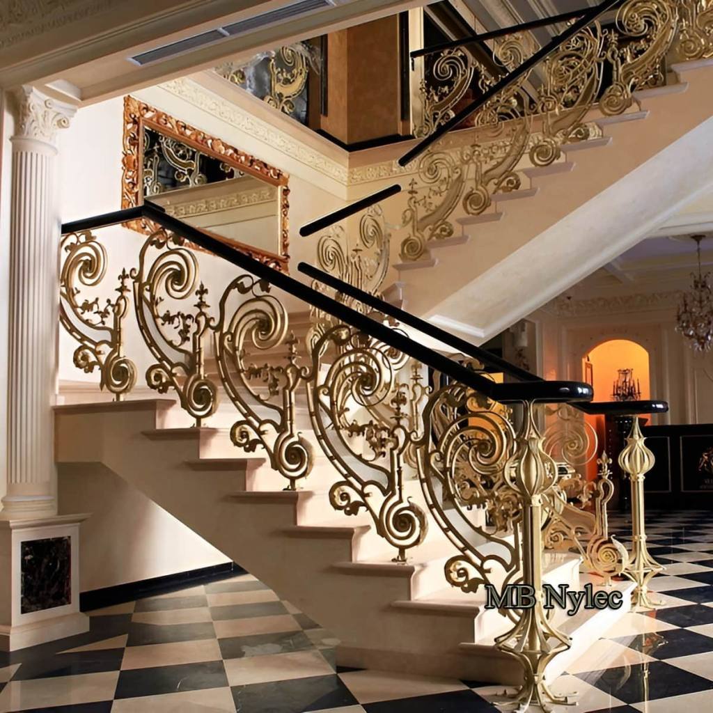 Gilded palace stair railing BA62 with a black wooden handrail on a double marble staircase