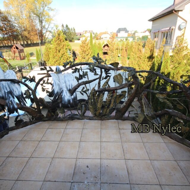 Heron balustrade around a tiled terrace