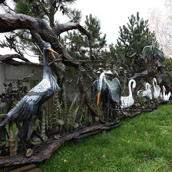 Heron Z19 as part of a large forged garden scene with other birds