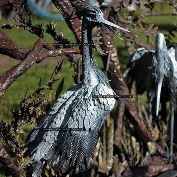 Close view of the layered blue-grey feathers of the steel heron Z19