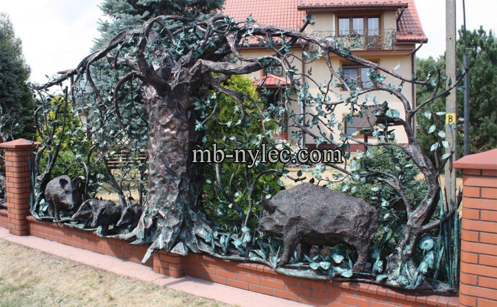 Hunting fence BM23 with a family of wild boar on a brick wall