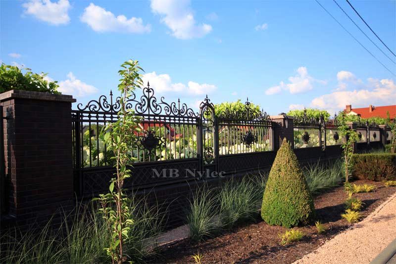 Long run of fence BP54 along a street with brick pillars and S4 posts