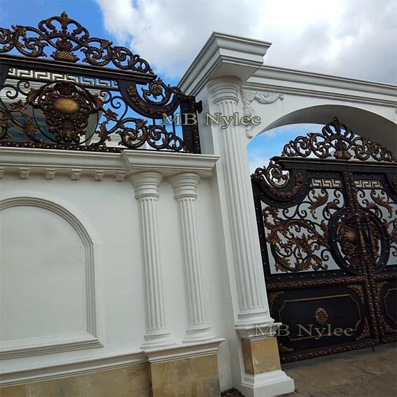 Oriental gate BP130 between white classical pillars