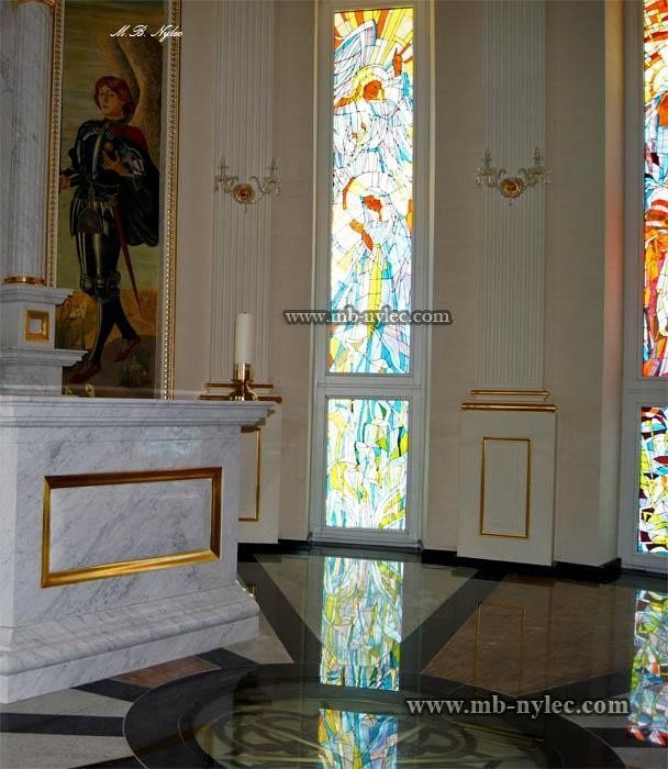 Stained glass windows beside the altar of a private chapel