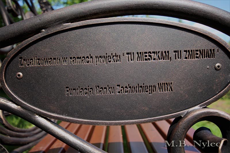 Side plaque on bench MK1C naming the local project it was made for