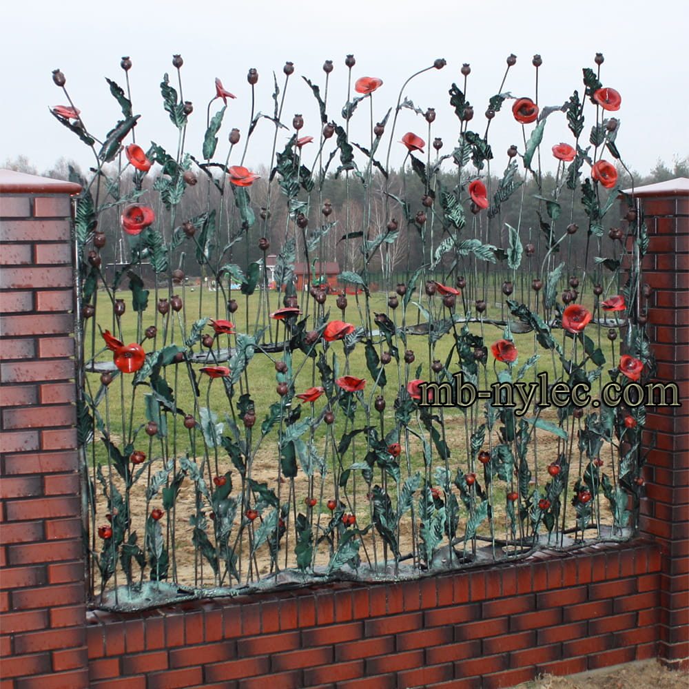 Forged fence span BM48 with red poppies and poppy heads between brick pillars