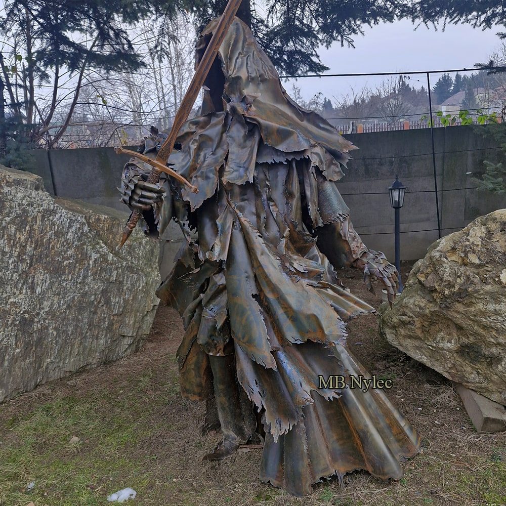 Steel Ringwraith sculpture with a raised sword and tattered cloak