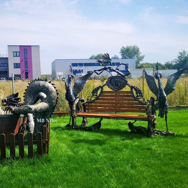 Sculpted steel bench in the grounds of an ecological theatre