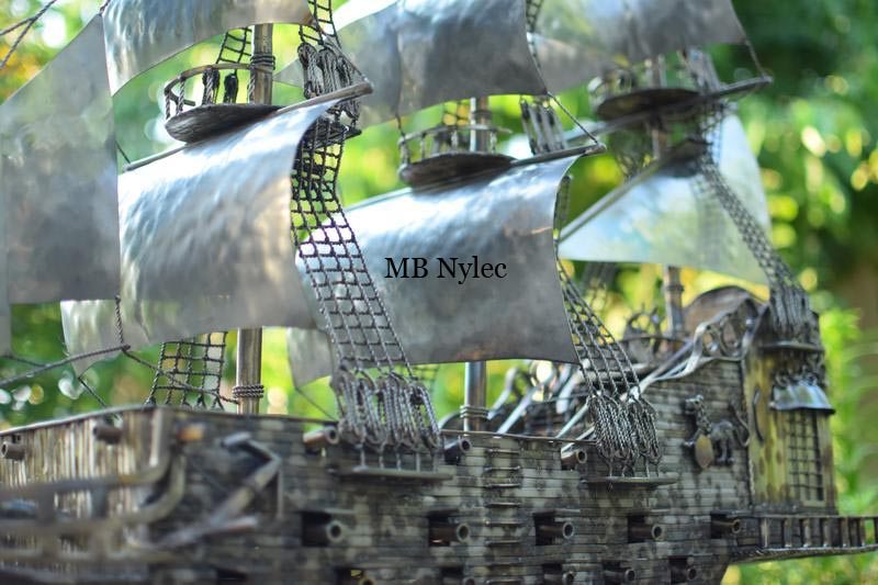 Close view of the hammered stainless sails of the ship Glory