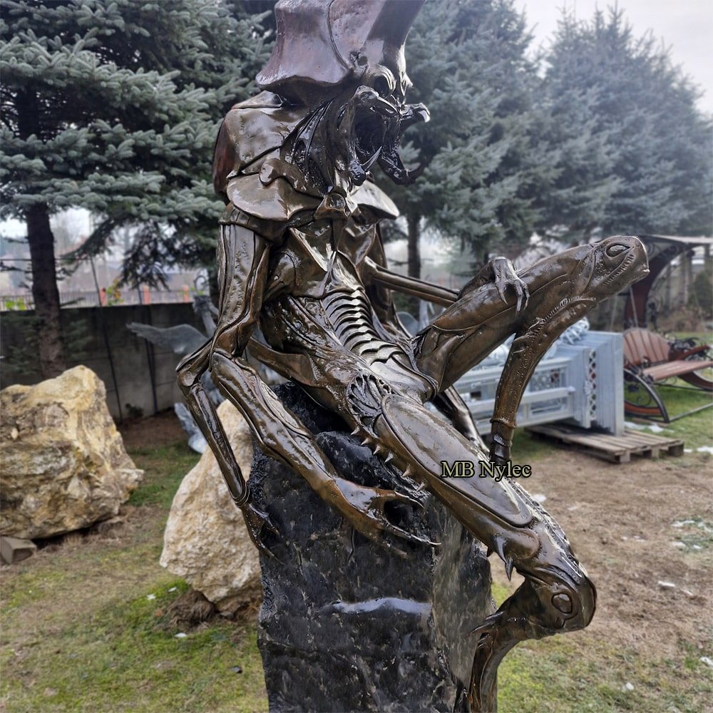 Steel beetle-like demon with many legs gripping a stone