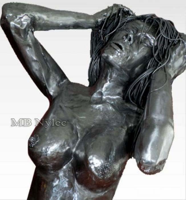 Polished steel bust of a woman with arms raised to her hair of fine steel strands